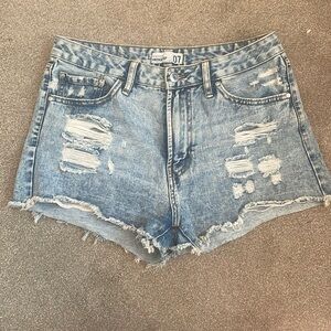 Vintage rip blue jean shorts denim